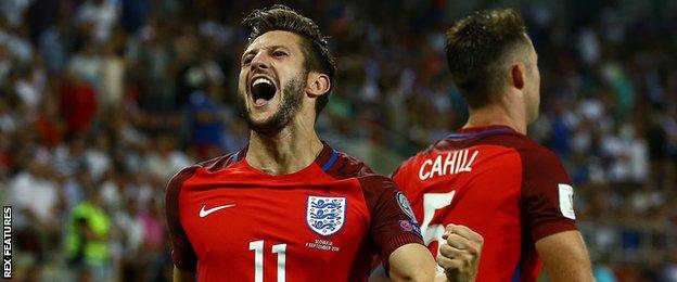 Adam Lallana celebrates his goal for England against Slovakia