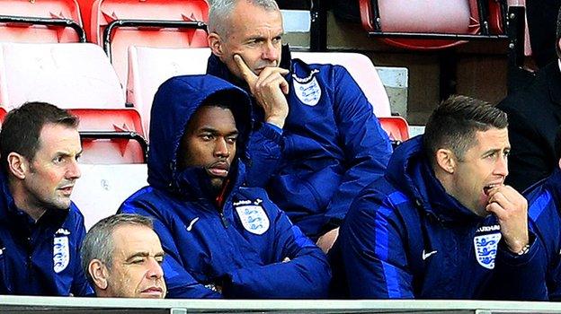 Daniel Sturridge looks on as he missed England's game against Australia with a calf injury