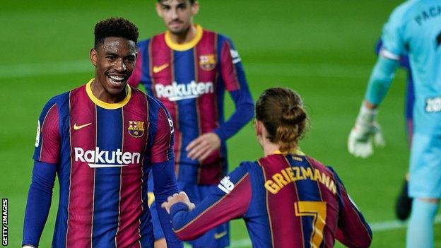 Junior Firpo celebrates a Barcelona goal