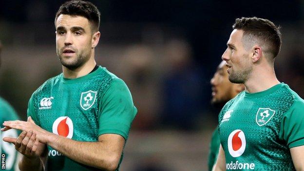 Conor Murray and John Cooney are vying for the starting spot in Saturday's game against Wales