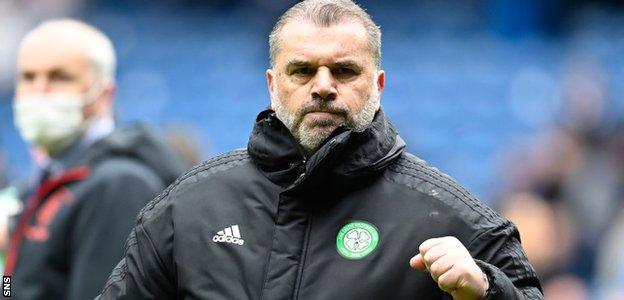 Celtic manager Ange Postecoglou celebrates at Ibrox