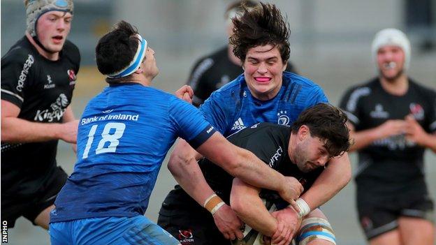 Ulster A's Bill Johnston is tackled by Leinster A duo Tom Clarkson and Alex Soroka in Friday's game at Kingspan Stadium