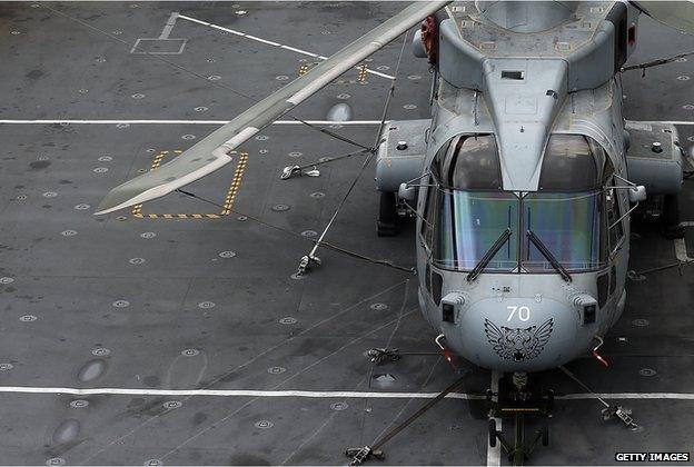 Merlin helicopter on the flight deck of HMS Illustrious