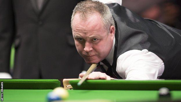 John Higgins plays a shot at the recent UK Championship