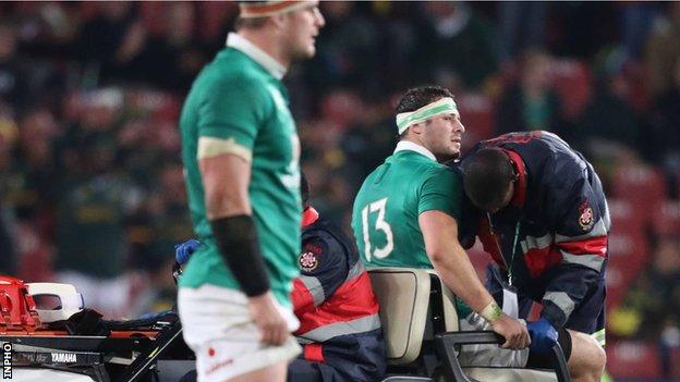 An injured Robbie Henshaw prepares to leave the action in Johannesburg