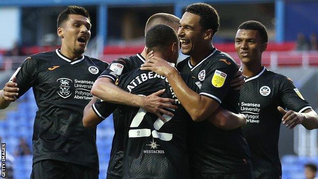 Joel Latibeaudiere is congratulated by team-mates by scoring his first senior goal in English football