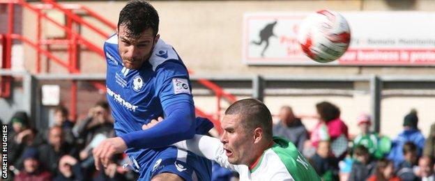 Airbus UK's Chris Budrys goes close with a header