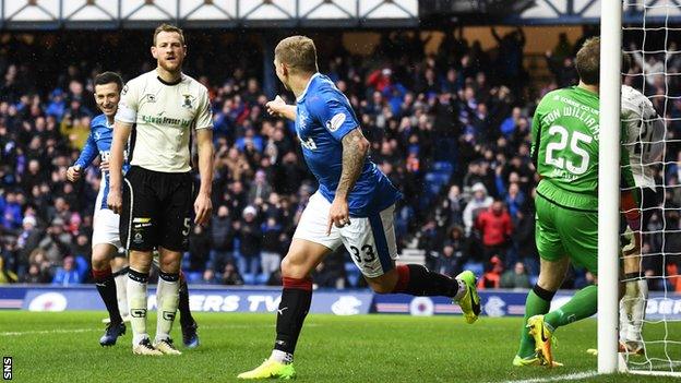 Martyn Waghorn turns away to celebrate Rangers scoring the opening goal