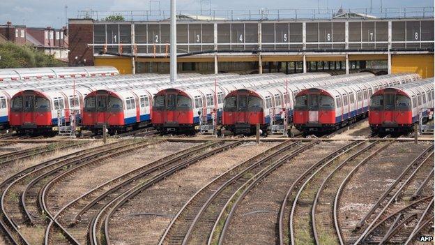 tube trains parked at the Northfields Depot