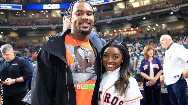 Houston Texans safety Jonathan Owens and Olympic gymnastics champion Simone Biles