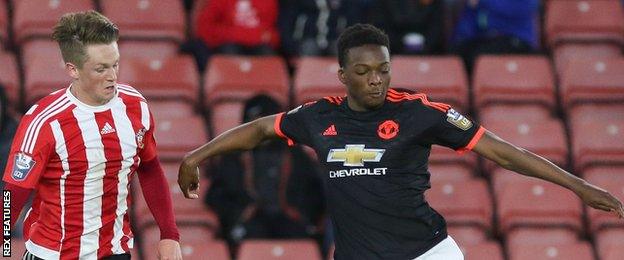 Matty Willock (right) in action for Manchester United's Under-21s