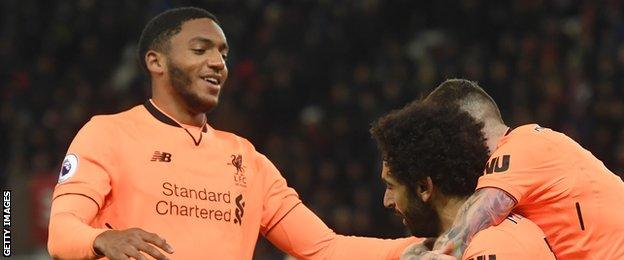 Joe Gomez celebrates Mohamed Salah's goal