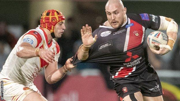 Gil Dudson in action for Salford against new club Catalans