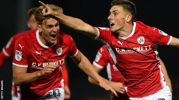 Joe Williams celebrates Barnsley's third goal against Burton