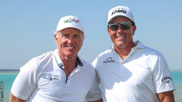 Greg Norman (left) and Phil Mickelson