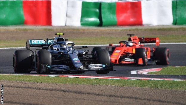 Sebastian Vettel and Valtteri Bottas racing at the Japanese Grand Prix