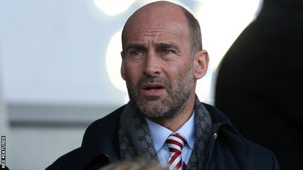 Sunderland chief executive Martin Bain looks on