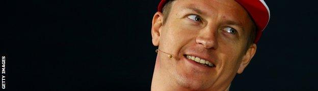 Kimi Raikkonen smiles at a press conference