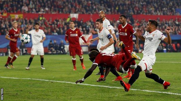 Sadio Mane scores for Liverpool against Sevilla in the Champions League