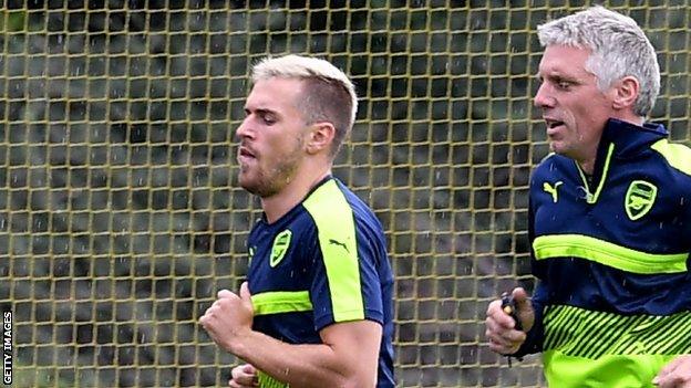 Aaron Ramsey (left) with Arsenal's assistant fitness coach Craig Gant