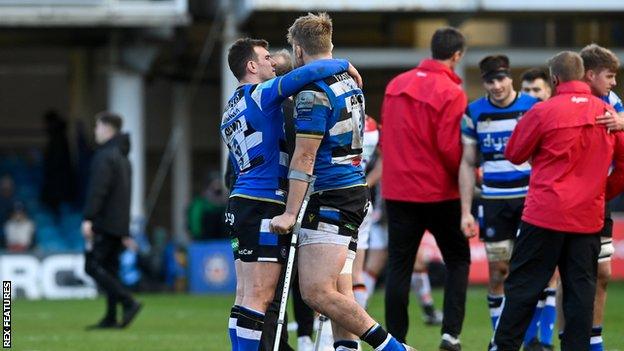 Josh McNally with team-mate Ben Spencer after the defeat to Leicester