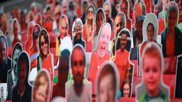 Cardboard cut-outs of Charlton fans