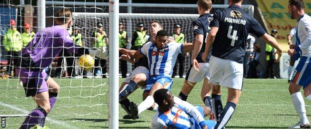 Miles Addison forces the ball over the line for Kilmarnock's second goal