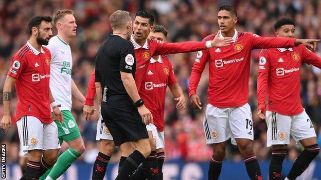 Cristiano Ronaldo speaks to referee Craig Pawson