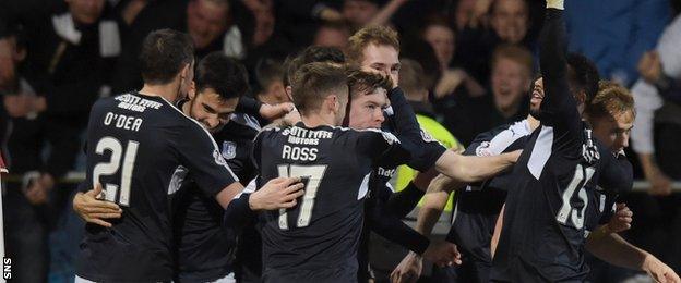 Dundee players celebrate