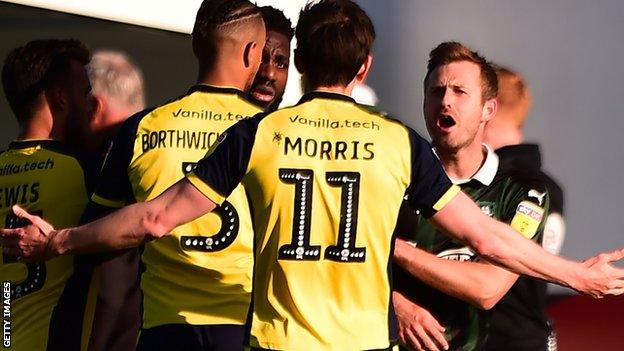 Plymouth and Scunthorpe players clash after United's second goal