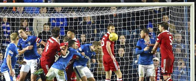 Andrew Considine scores