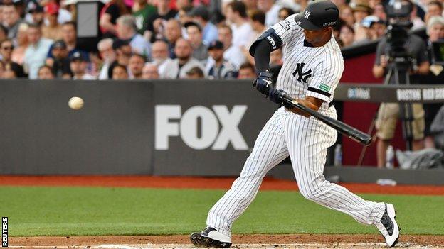 Aaron Hicks hits a home run for New York Yankees during the first inning against the Boston Red Sox at London Stadium