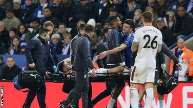 Brady is stretchered off against Leicester City