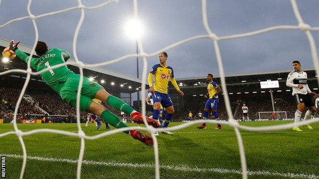 Aleksandar Mitrovic scores his first goal against Southampton