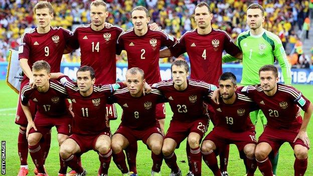 Russia pose for a team photo before their 2014 group game against Algeria