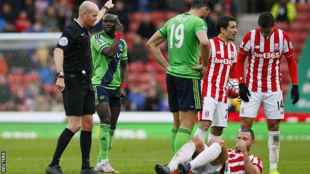 Sadio Mane was sent off after challenging for the ball with Stoke's Erik Pieters (on the ground)