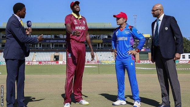 West Indies captain Jason Holder and Afghanistan skipper Asghar Stanikzai