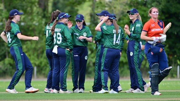 Ireland celebrate dismissing a Dutch batter in Monday's victory in Amstelveen