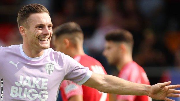 Macaulay Langstaff celebrates scoring for Notts County