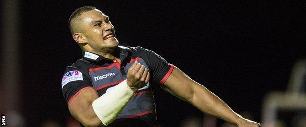 Robbie Freuan celebrates scoring the fourth try