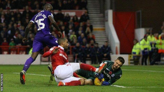 Jack Butland makes a save against Nottingham Forest