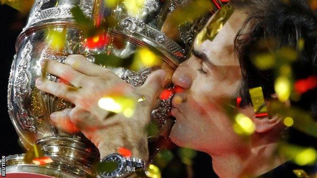 Roger Federer with a trophy