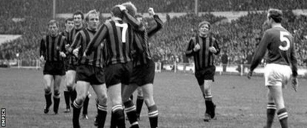 Manchester City's players congratulate Mike Summerbee (7) after creating the matchwinner for Neil Young (third from left) in the 1969 FA Cup final