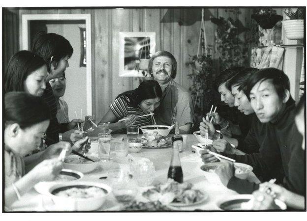 Dick Swanson, Germaine and the family having dinner at home in the US