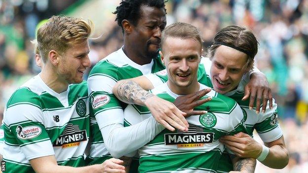 Celtic celebrate the opening goal by Leigh Griffiths (second right)