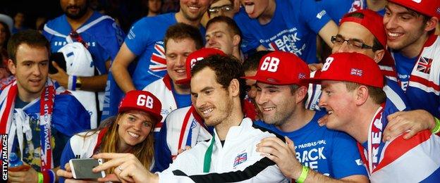 Andy Murray poses with fans after winning the Davis Cup with Great Britain