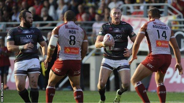 Chris Houston launches a Widnes attack in their crunch game in the Qualifiers against Catalans Dragons in Perpignan