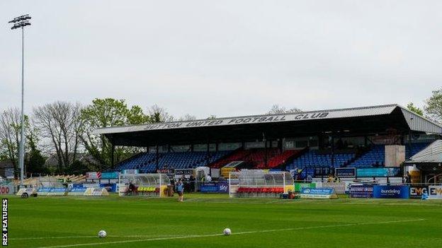 Sutton United's main stand at Gander Green Lane