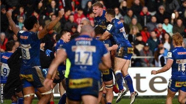 Exeter players celebrate