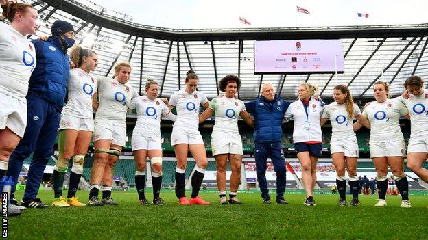 England's women in a huddle at Twickenham